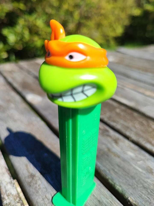 PEZ SPENDER TEENAGE MUTANT NINJA TURTLES MICHELANGELO / VINTAGE